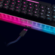 A rear view of the Hyte keybaord, showing its RGB glowing base and USB-C port.